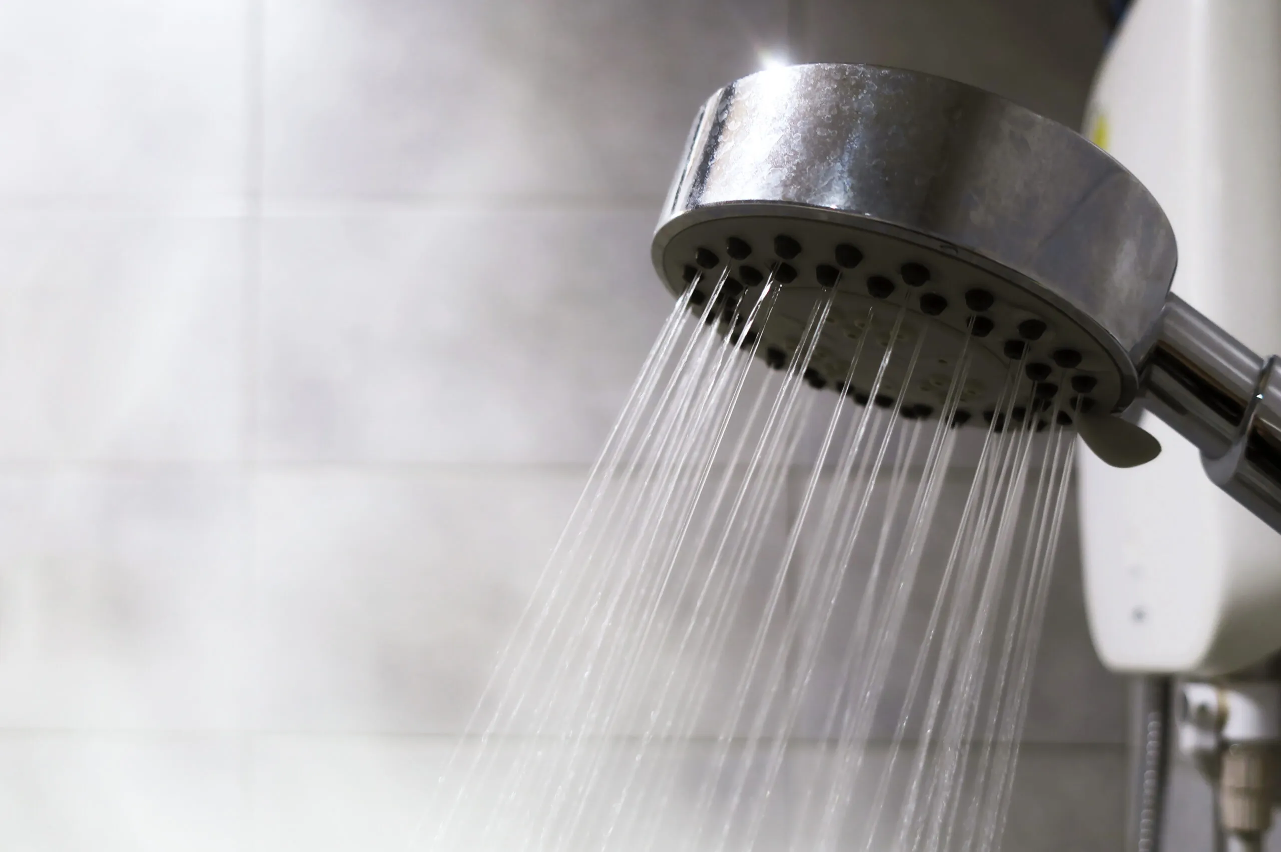 Water spraying from a shower head