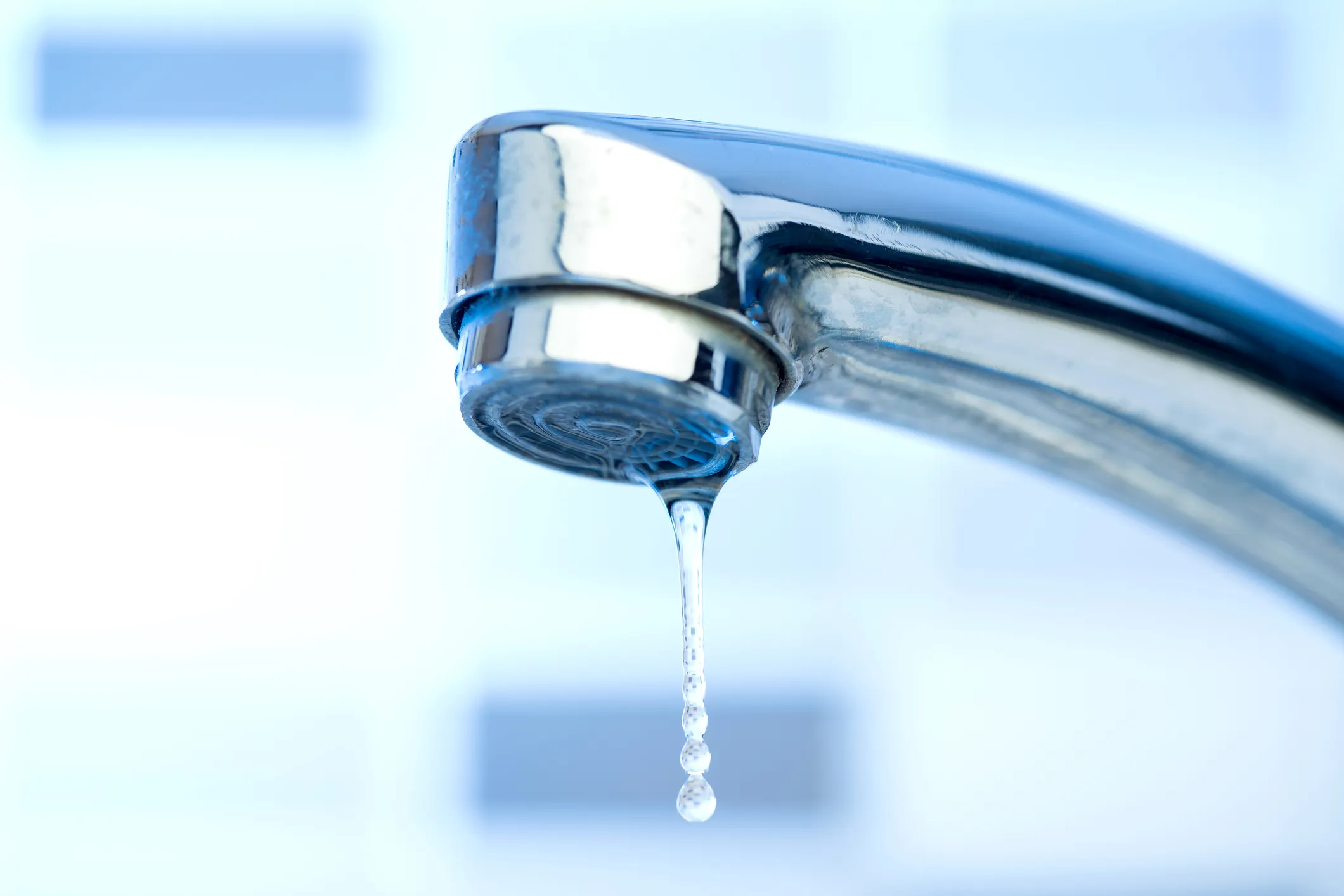 Drop of water from the Faucet high quality and high resolution studio shoot